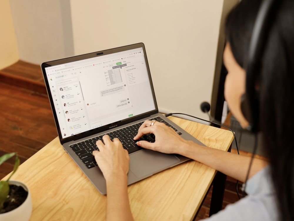 Common Health staff member using the digital platform